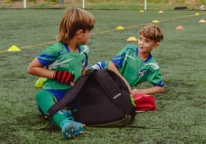 botines futbol tapones aluminio cesped verde